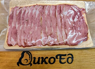 Фото Dried ham of wild boar (cut jamon)